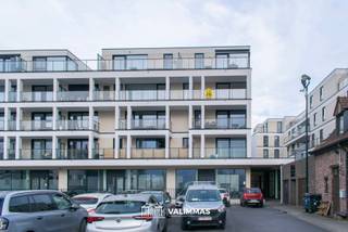 VALIMMAS verhuurt in het centrum van Asse dit rustig gelegen en bijzonder energiezuinige hoekappartement met mooi terras, kelder en...