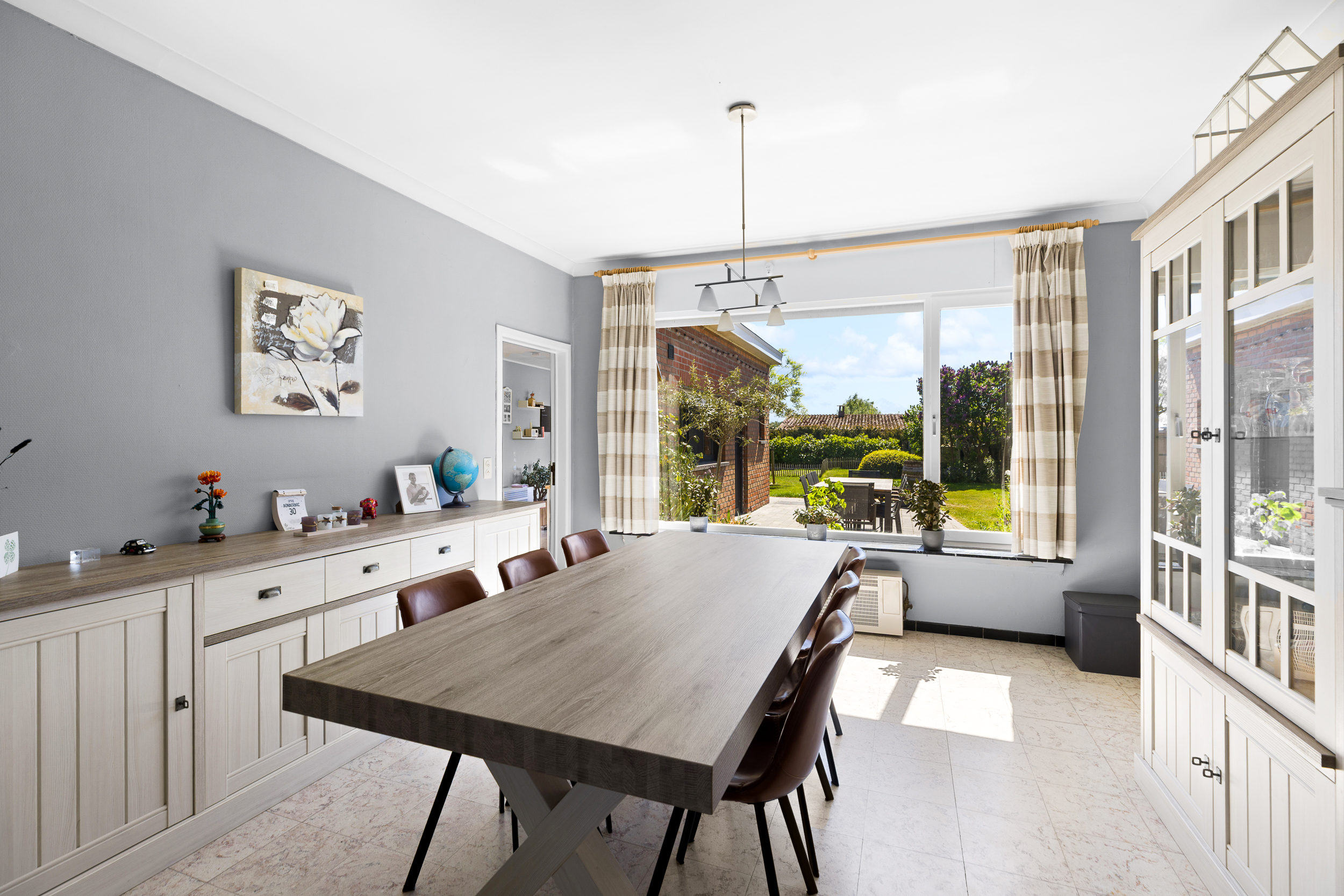 Gelijkvloers wonen met tuin en potentieel - foto 2