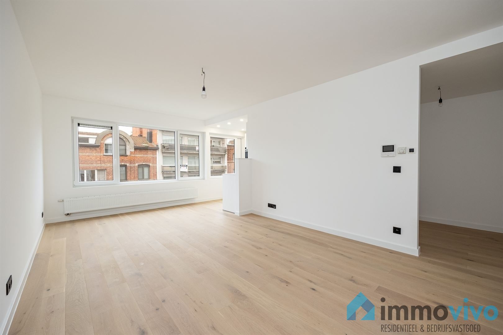 Luxueus gerenoveerd appartement met 2 slpk's en terras - foto 2