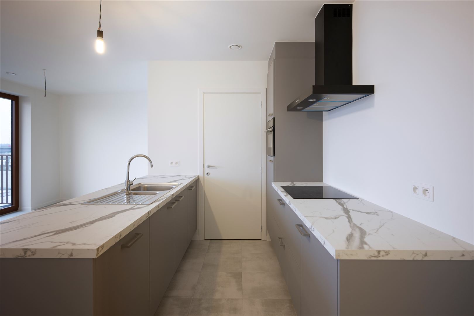 Nieuwbouw tweeslaapkamerappartement met terras - foto 4