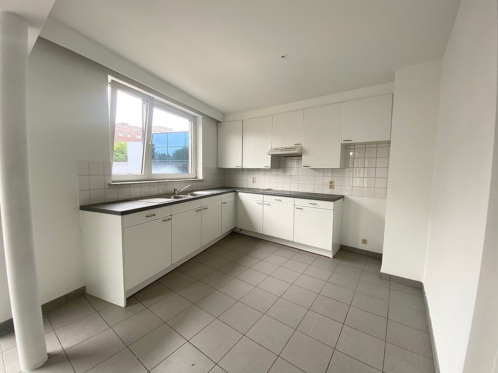 Opbrengsteneigendom bestaande uit 6 appartementen, dubbele garagebox en 6 staanplaatsen te Aalst - foto 4