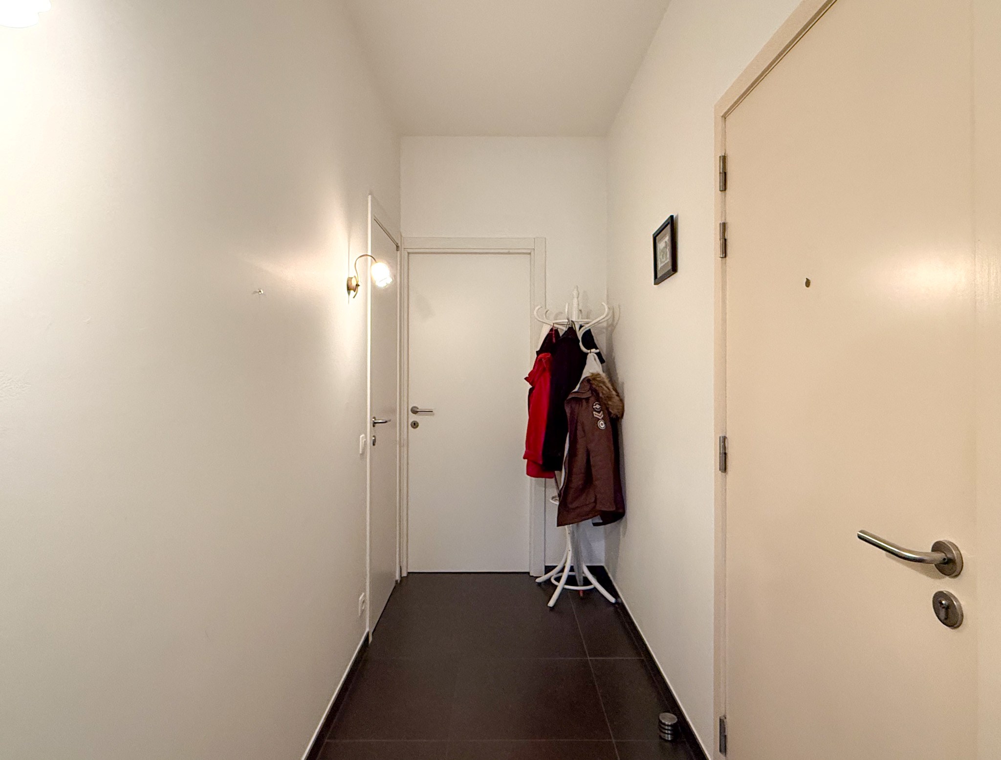 Appartement met zicht op de Grote Markt  met 1 slaapkamer, 2 terrassen en autostaanplaats - foto 2