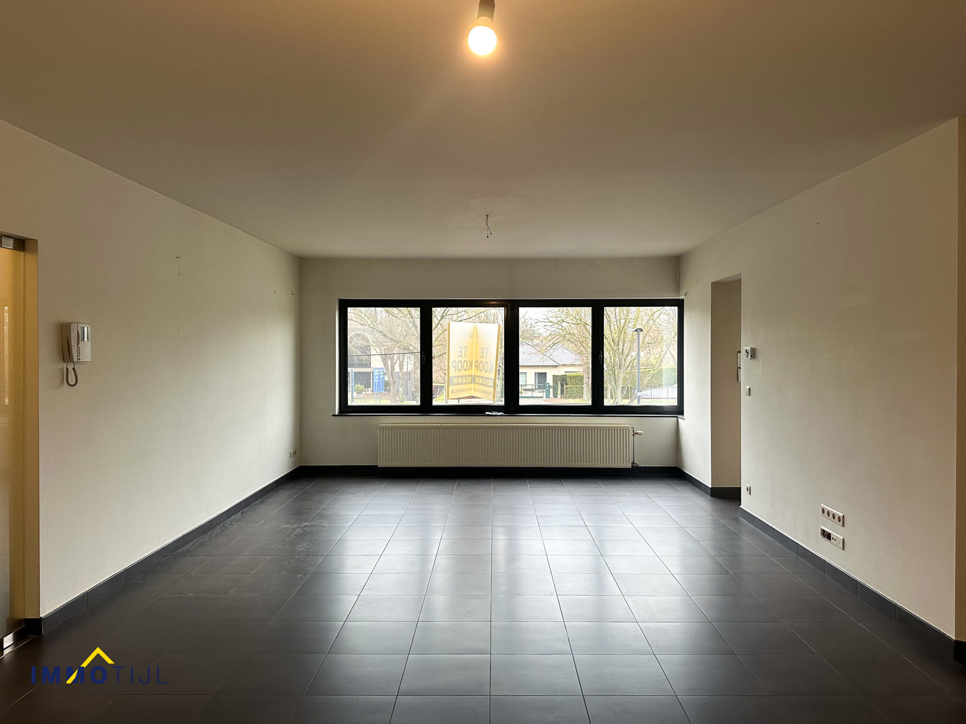 Knap appartement met berging, garage en 2 autostaanplaatsen! - foto 4