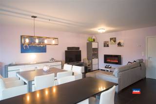 OELEGEM - INTERIOR FLOOR APARTMENT WITH TWO BEDROOMS, GARDEN AND TWO CAR STORAGE PLACES - EPC 140 kWh/m² - Composition as follows: entrance hall...