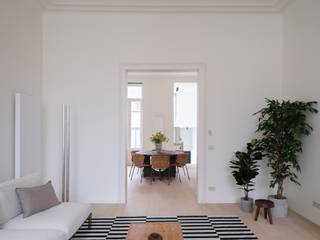 Luxueus appartement met groot volume en terras op toplocatie aan de Sint-MichielskerkUnieke reconversie van voormalig koetshuis naar een...