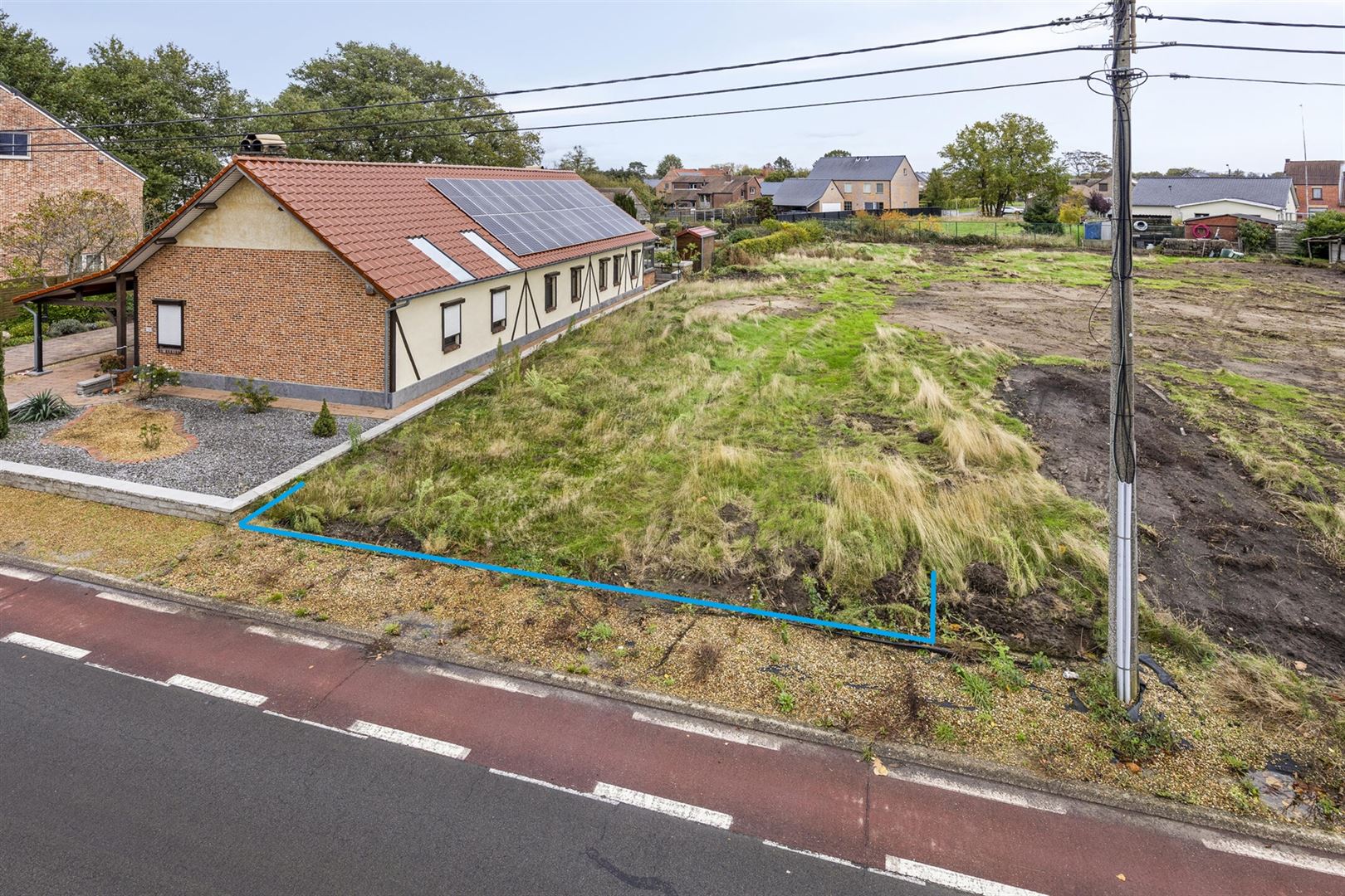 TE KOOP: Bouwgrond voor halfopen bebouwing te Paal! - foto 1