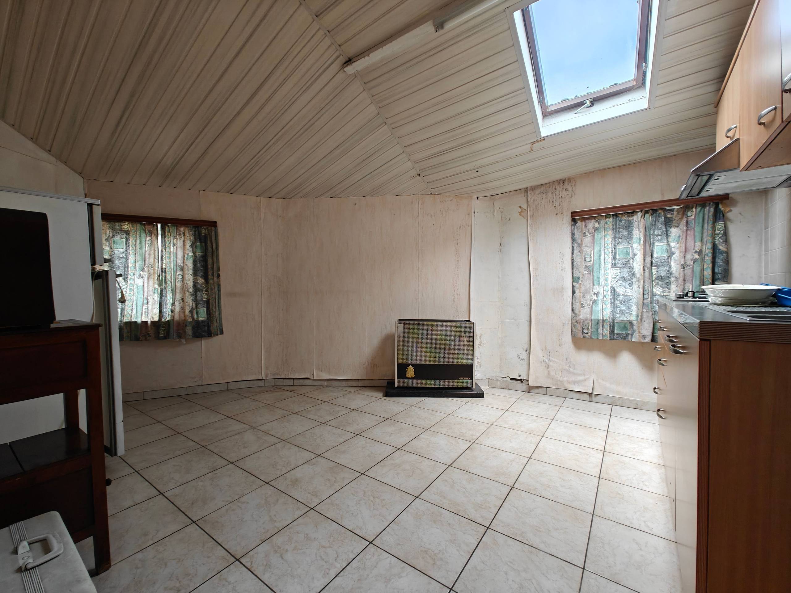 Te renoveren woning met zonnige tuin in Pollinkhove - foto 4