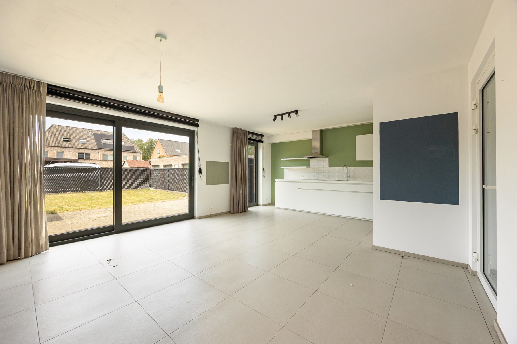 Gelijkvloers appartement met tuin en parkeerplaats - foto 3