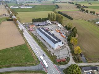 Agricultural site for sale in Oostvleteren. The total land area is approximately 13,534 m² and is equipped with various warehouses and a...