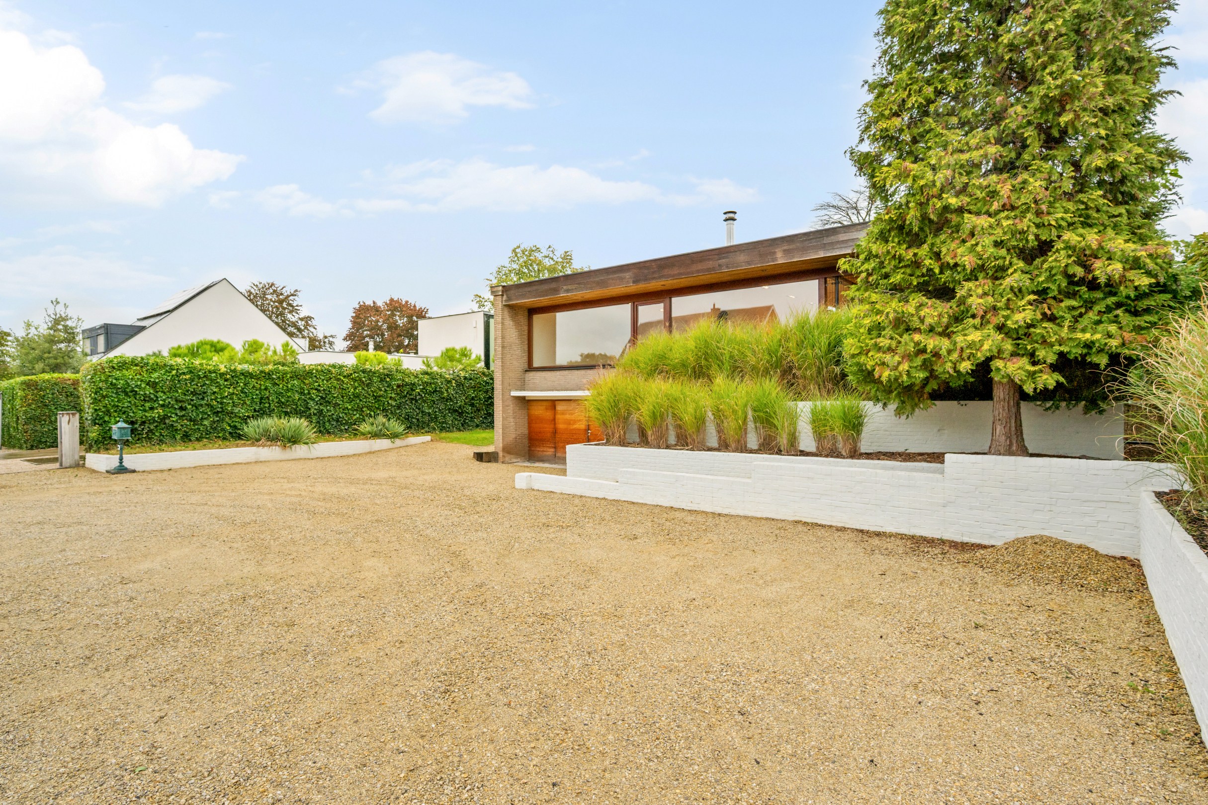 Villa avec étage de vie surélevé sur un magnifique terrain de 1 100 m² dans un quartier résidentiel à Hasselt. - photo 5