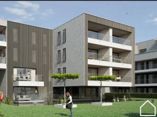 Het appartement is gelegen op de derde verdieping en werd op plan ingedeeld als volgt: Inkomhal met apart toilet en ruimte voor vestiaire,...