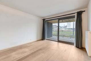 Gelijkvloers appartement met ruim overdekt terras, kelderberging en optionele staanplaats in LedebergIn de Jenny Tanghestraat 7 bus 001 te 9050...