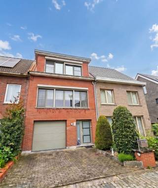 Through the entrance hall with guest toilet we enter on the 1st floor the renovated spacious living room with open kitchen fully equipped with...