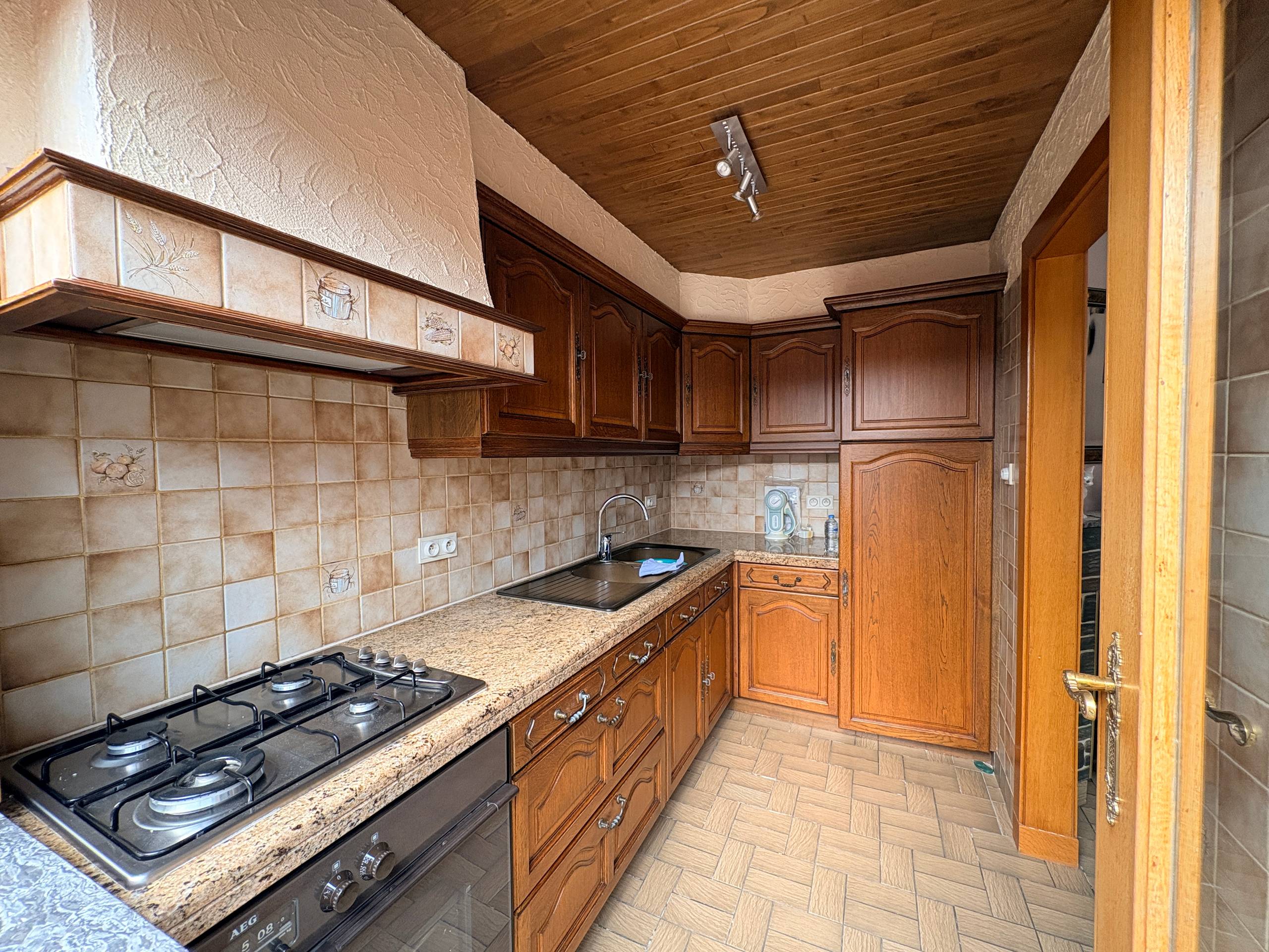 Nette en goed onderhouden woning met tuin. - foto 5
