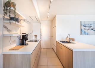 PRACHTIG duplex-appartement met VIER slaapkamers en DUBBELE garage te koop in hartje Koksijde !Dit unieke pand is gelegen op de 3de en 4de verdieping...