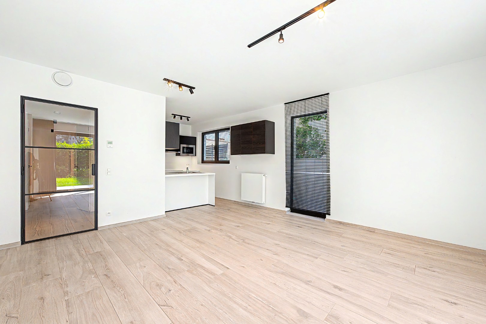 Nieuwbouwappartement met tuin en terras - foto 5