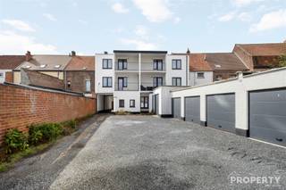 For sale: completely renovated ground floor apartment with small courtyard and garage in WevelgemThis move-in ready ground floor apartment is located...