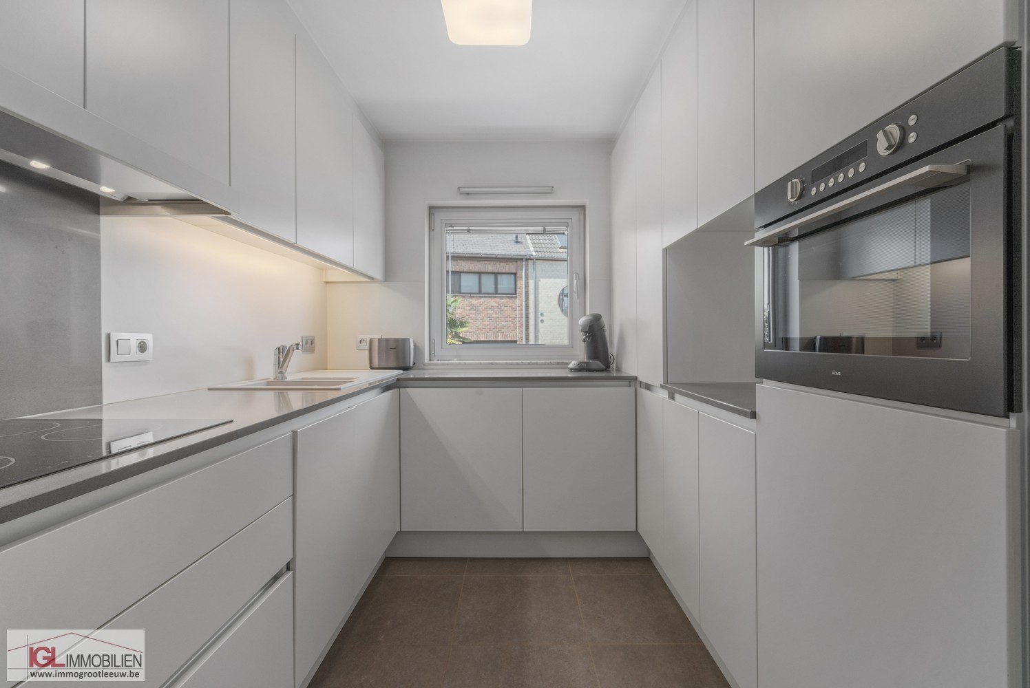 Modern appartement met 2 slaapkamers en garage! - foto 4