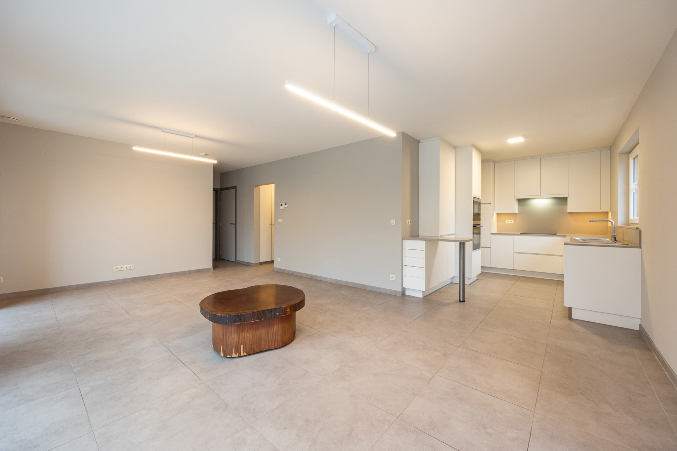 Recent gelijkvloers appartement van 80m² met 2 slks, tuin, garagebox, autostaanplaats en kelderberging. - foto 5