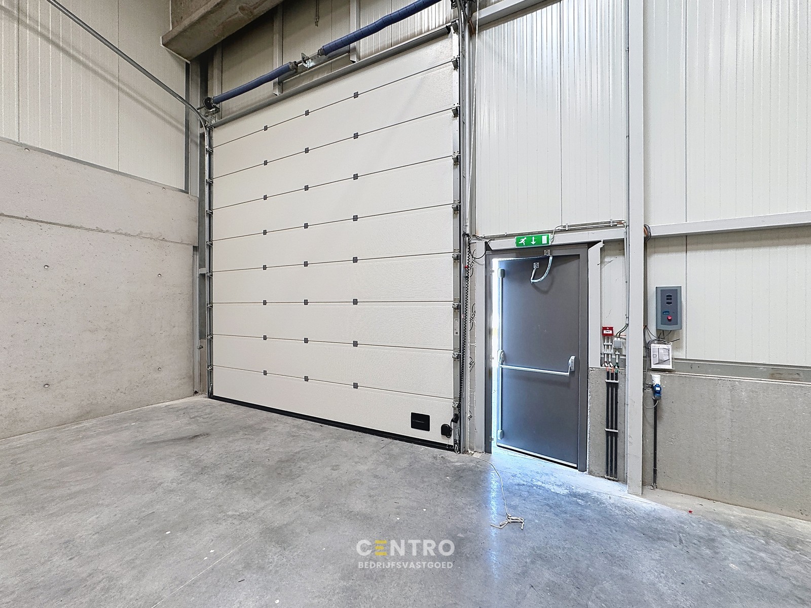NB KMO-UNIT (202.46m²) te koop met 2 private parkeerplaatsen voor de deur, elektrische sectionaalpoort en sanitair blok op industriezone "Herdersbrug" te 8000 Brugge - foto 5