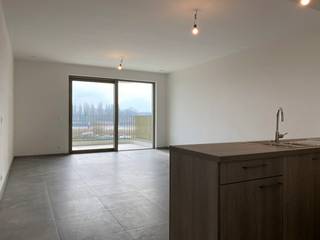 TE HUUR: recent appartement in het project Brig in BoomIndeling:- inkomhal- woonkamer met open uitgeruste keuken- terras met zicht op het water...