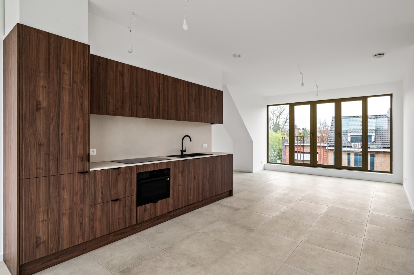 Ruim en licht nieuwbouw app. met 2 slpk., terras en garagebox - foto 1