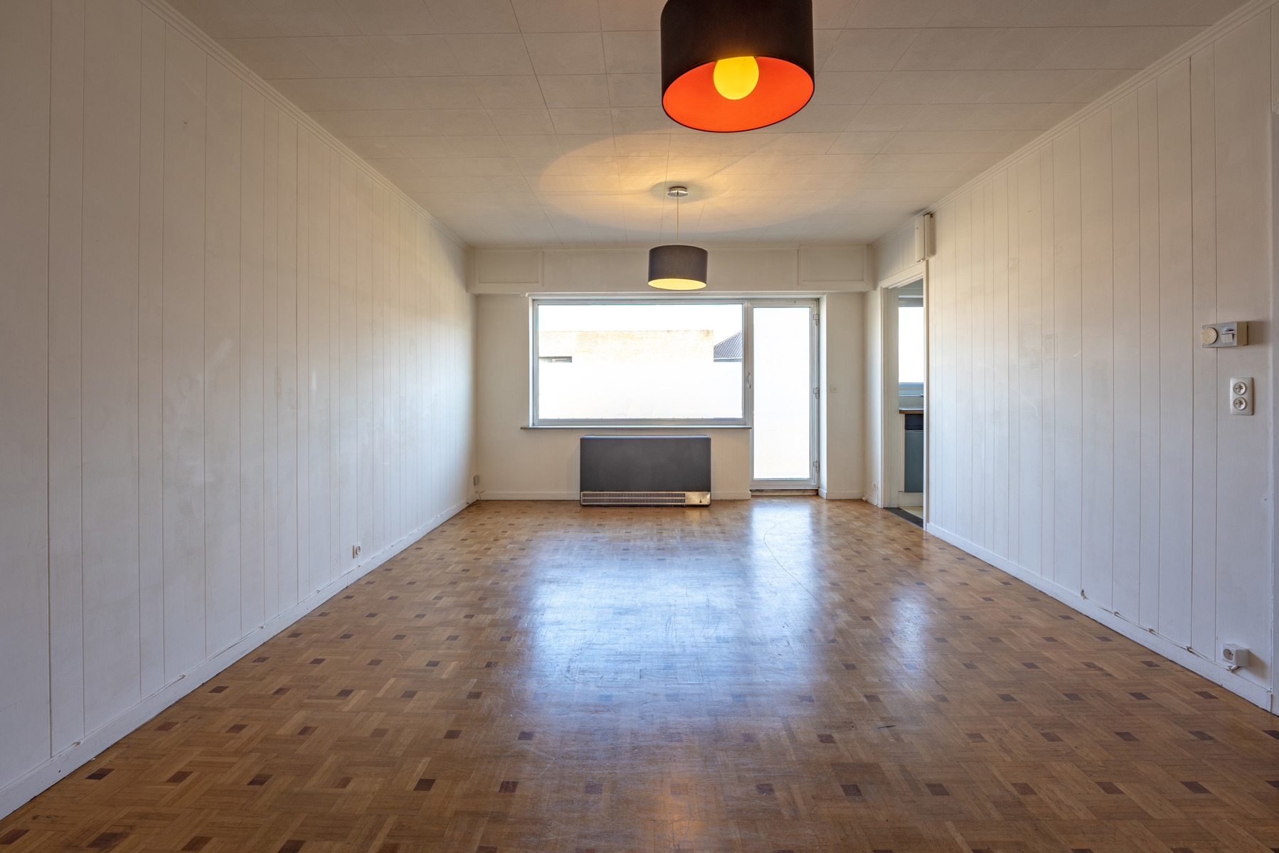 Opbrengsteigendom met 2 appartementen, inpandige garage en tuin - foto 3