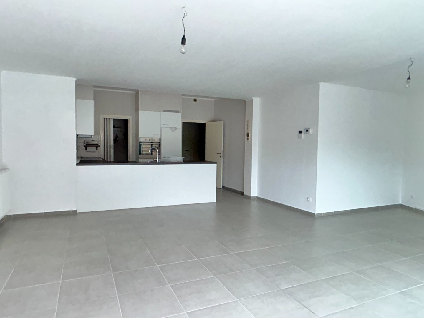 Gelijkvloers appartement van 106m² met garage en autostaanplaats - foto 2