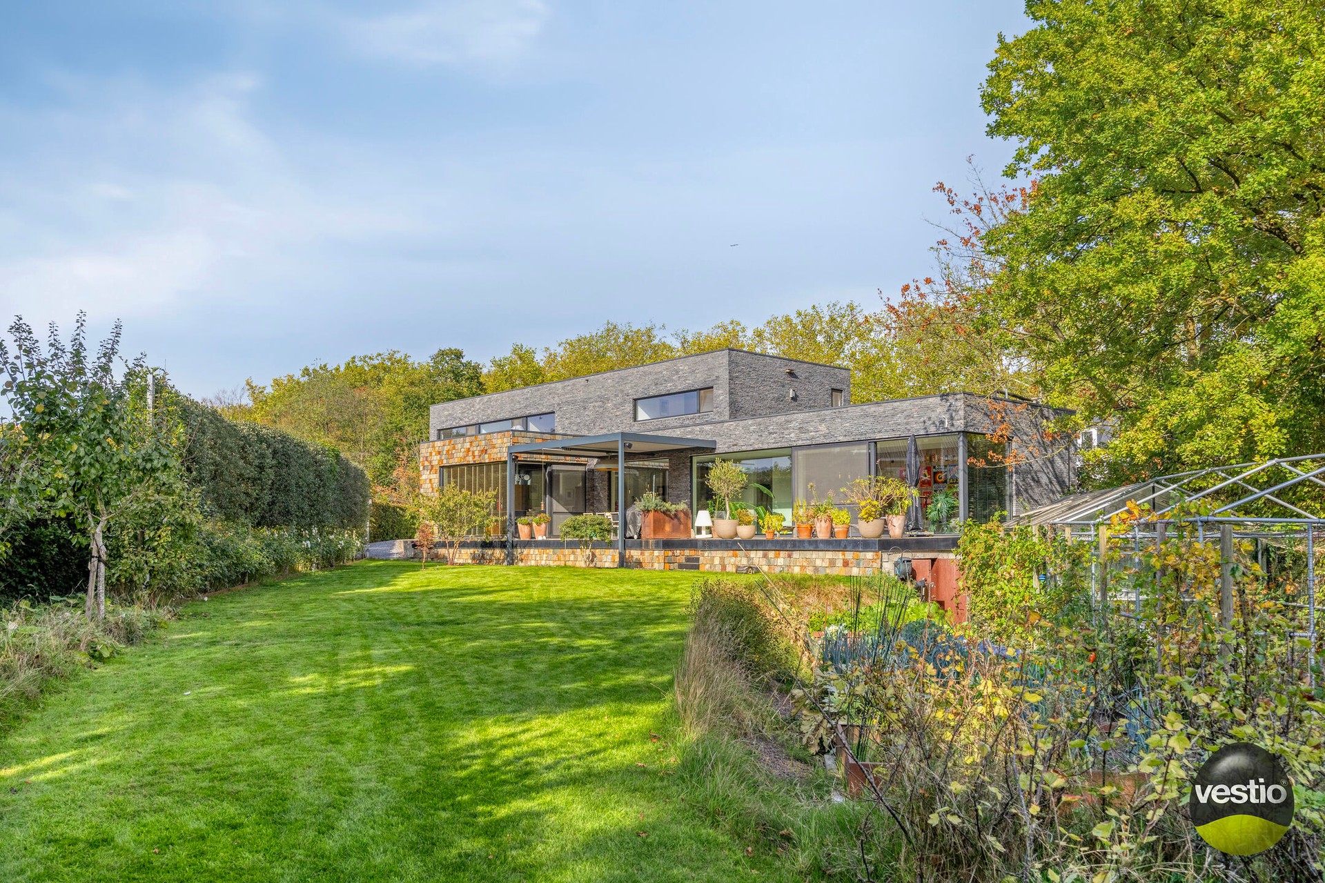 Moderne villa in de gegeerde Mombeekdreef – luxe, licht en rust op een toplocatie in Hasselt - photo 1