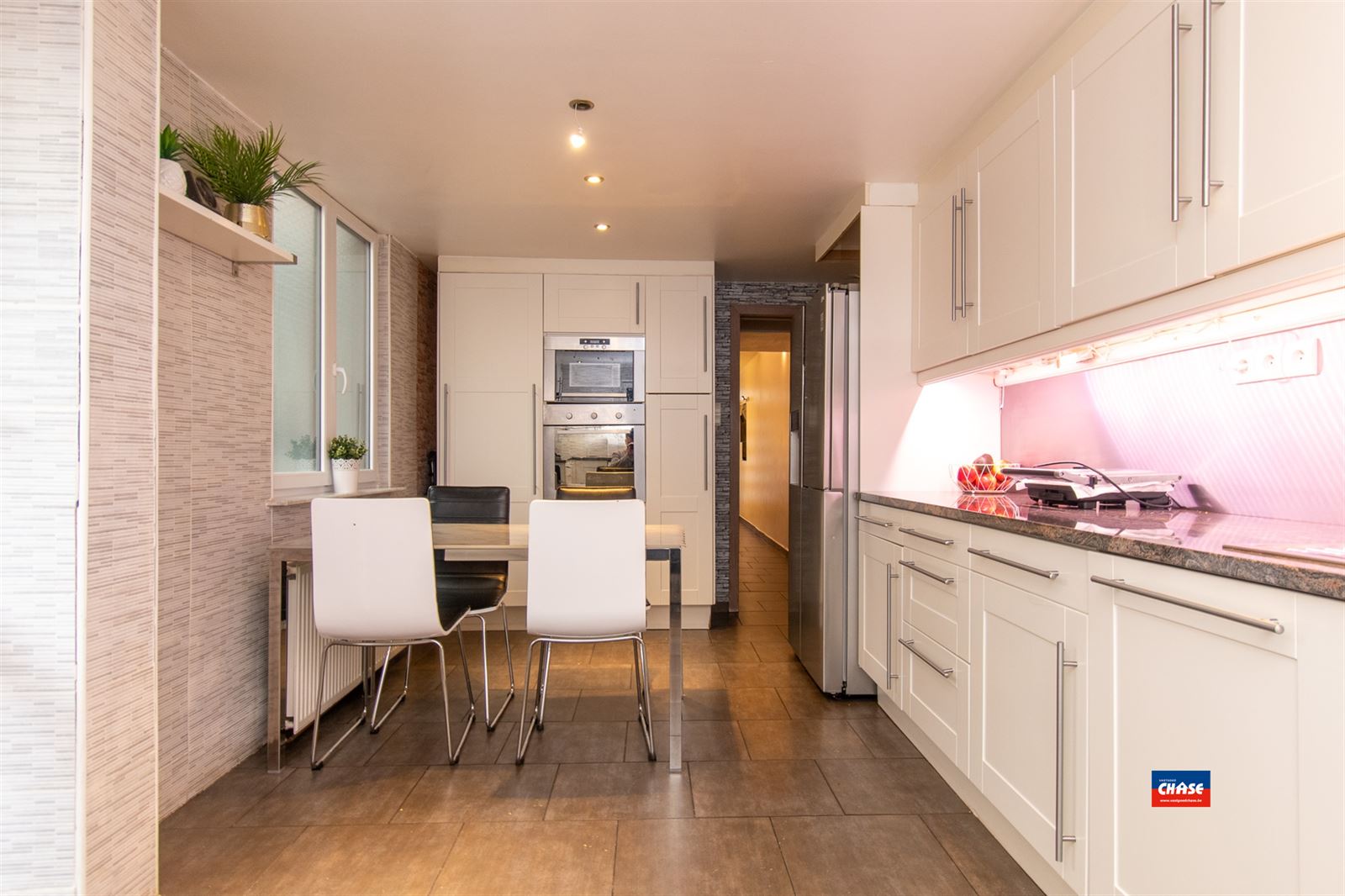 Gezinswoning met vier slaapkamers en tuin - foto 5