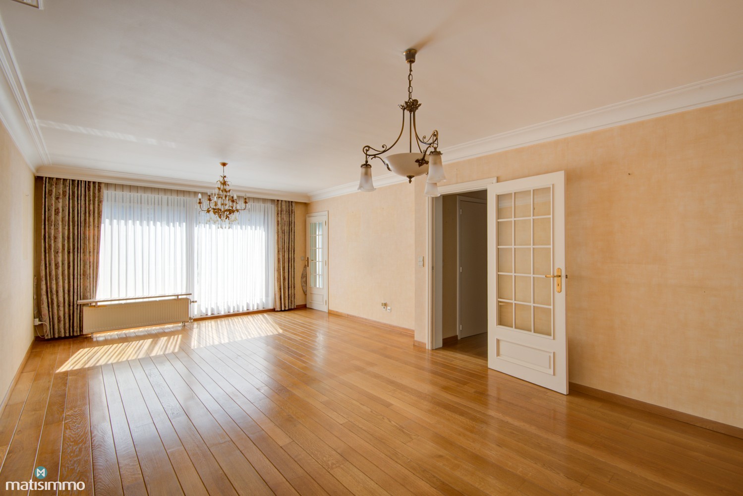 RUIM APPARTEMENT MET 2 SLAAPKAMERS, 2 TERRASSEN, KELDERBERGING EN ONDERGRONDSE AUTOSTAANPLAATS IN BILZEN-CENTRUM - foto 4