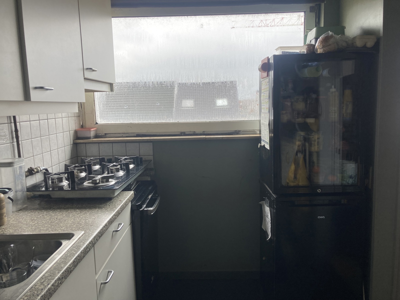 Centraal gelegen, te renoveren appartement met 2 slaapkamers! - foto 4