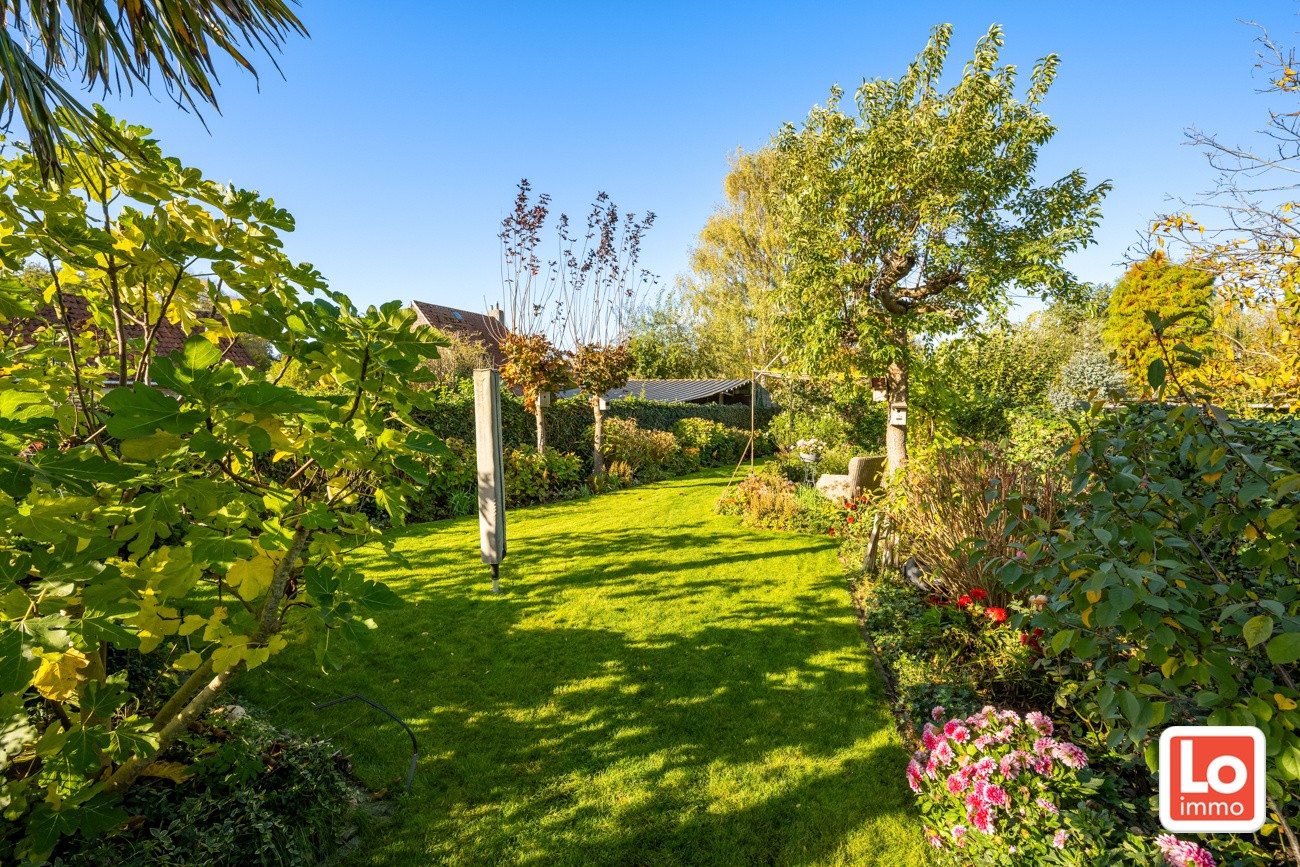 IN OPTIE! Charmante halfopen woning met inpandige garage op een rustige en groene locatie in Beervelde! - foto 3