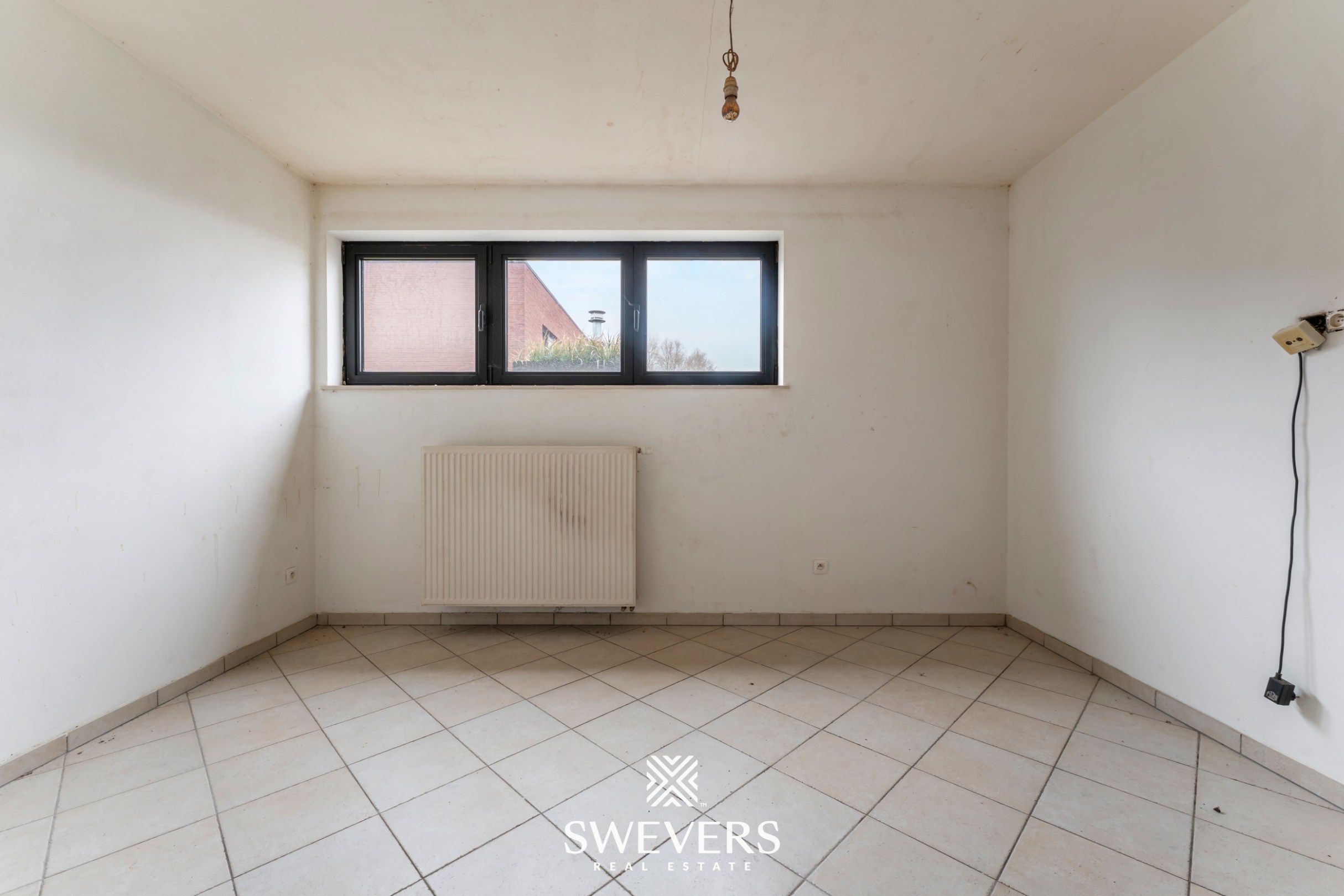 Centraal op te frissen appartement met potentieel in Halen - foto 5