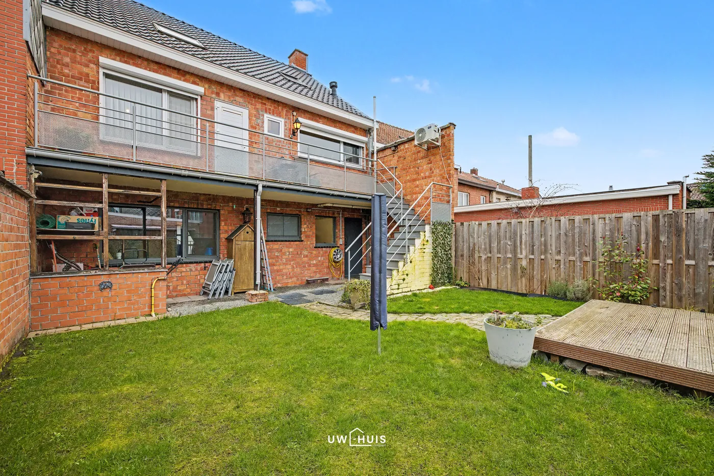 Gerenoveerde kangoeroewoning met 4 slaapkamers, garage en tuin in het centrum van Stekene - foto 4