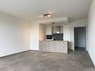 TE HUUR: recent appartement in het project Brig in BoomIndeling:- inkomhal- woonkamer met open uitgeruste keuken- terras met zicht op het water...