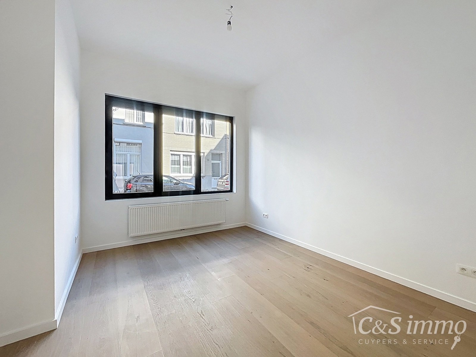 Gerenoveerd gelijkvloers appartement met stadstuin - foto 3