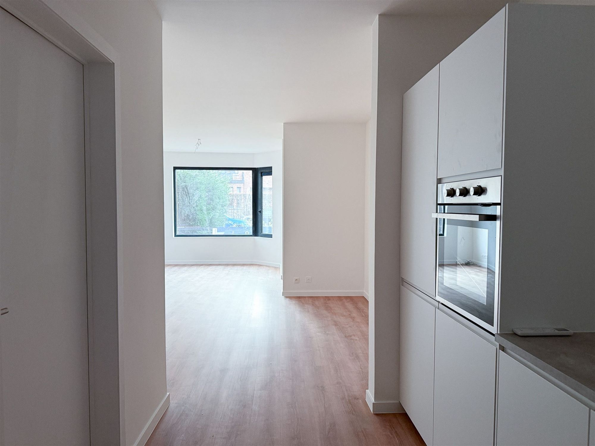 volledig vernieuwd appartement mét tuin - foto 3