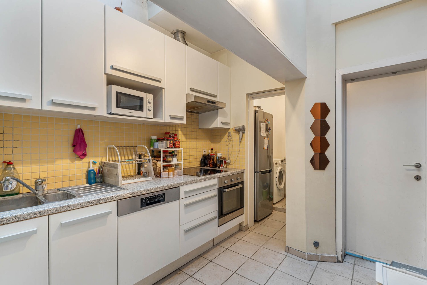 Centraal gelegen rijwoning met 2 ruime slaapkamers en een zolderkamer nabij het station te Leuven! - foto 4