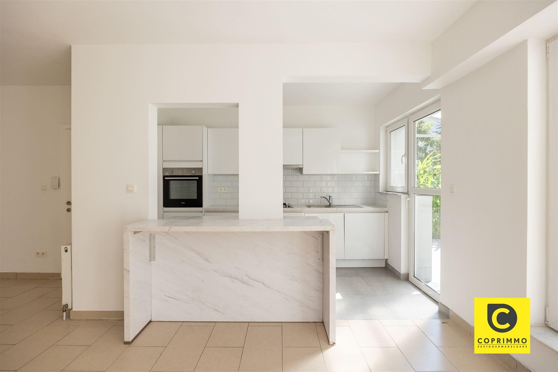 Instapklaar 3slpk appartement met tuin en garagebox ! - foto 5