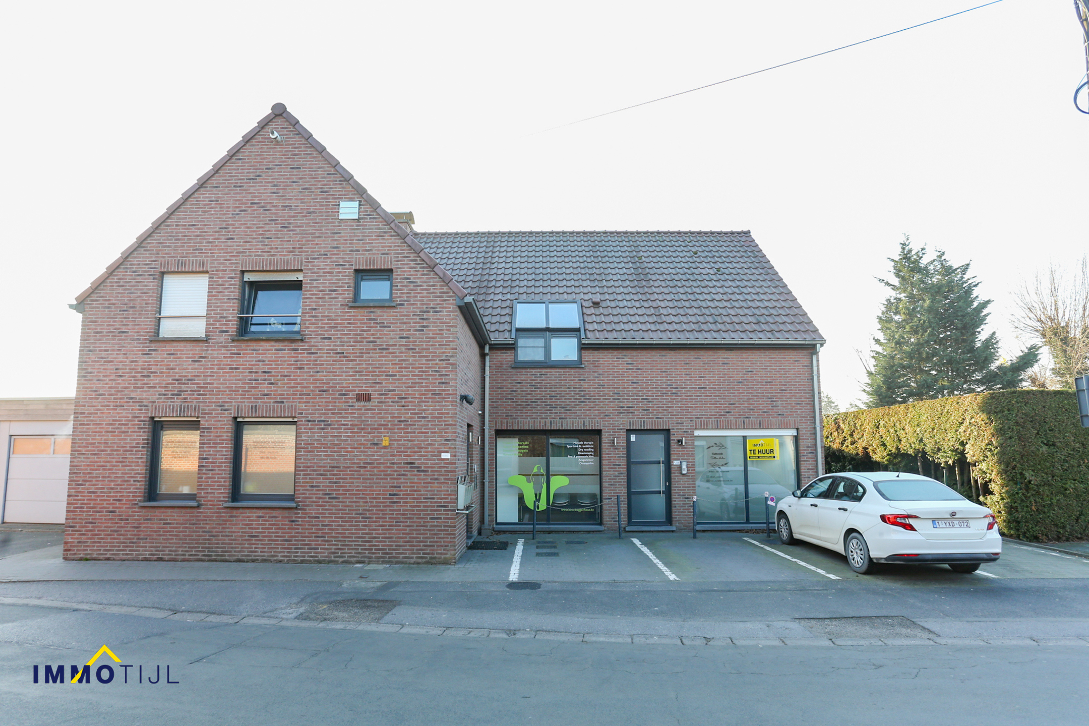 Handelsruimte met ruime opslagruimte in centrum Buggenhout - foto 2