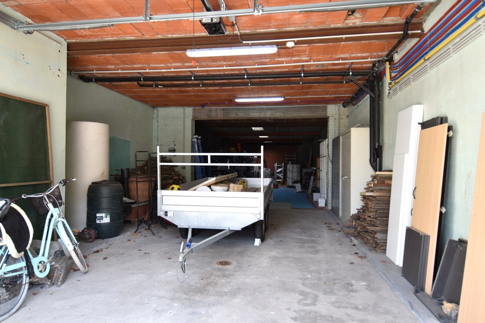 Opslagruimte van 144 m² met recent vernieuwd duplexappartement - foto 2