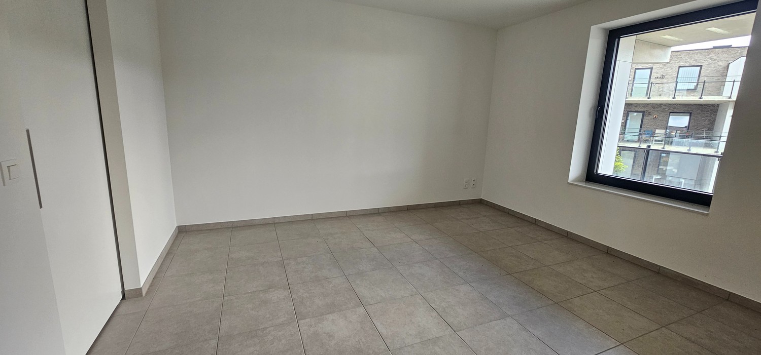 Nieuwbouwappartement met één slaapkamer gelegen in het commercieel centrum van Eisden. - foto 5