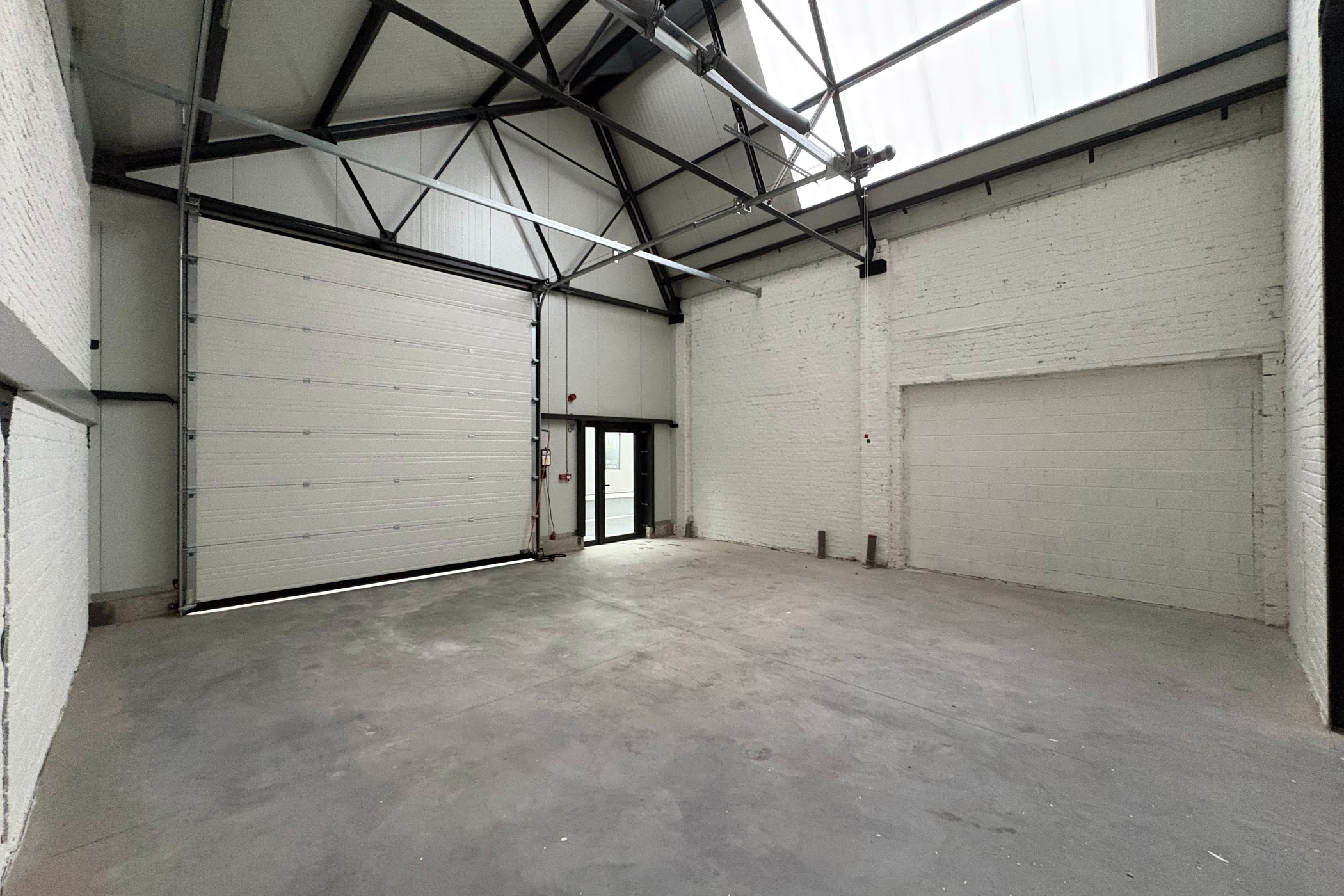 Magazijn 196m² te huur In Kalken - photo 4