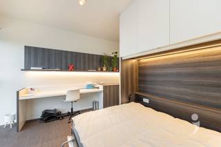 Deze moderne studentenkamer met eigen sanitair is gelegen in studentenresidentie Woods, vlakbij het Belle-Vue park. De residentie is gelegen op...