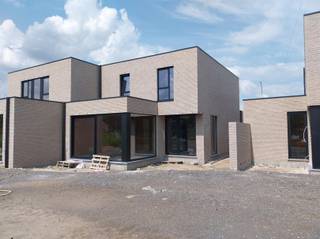 VERKOOP AAN 6% BTW mogelijk onder voorwaarden !Nieuwbouwproject van 5 ruime, moderne woningen met plat dak nabij het Centrum van Mol.Deze woningen...