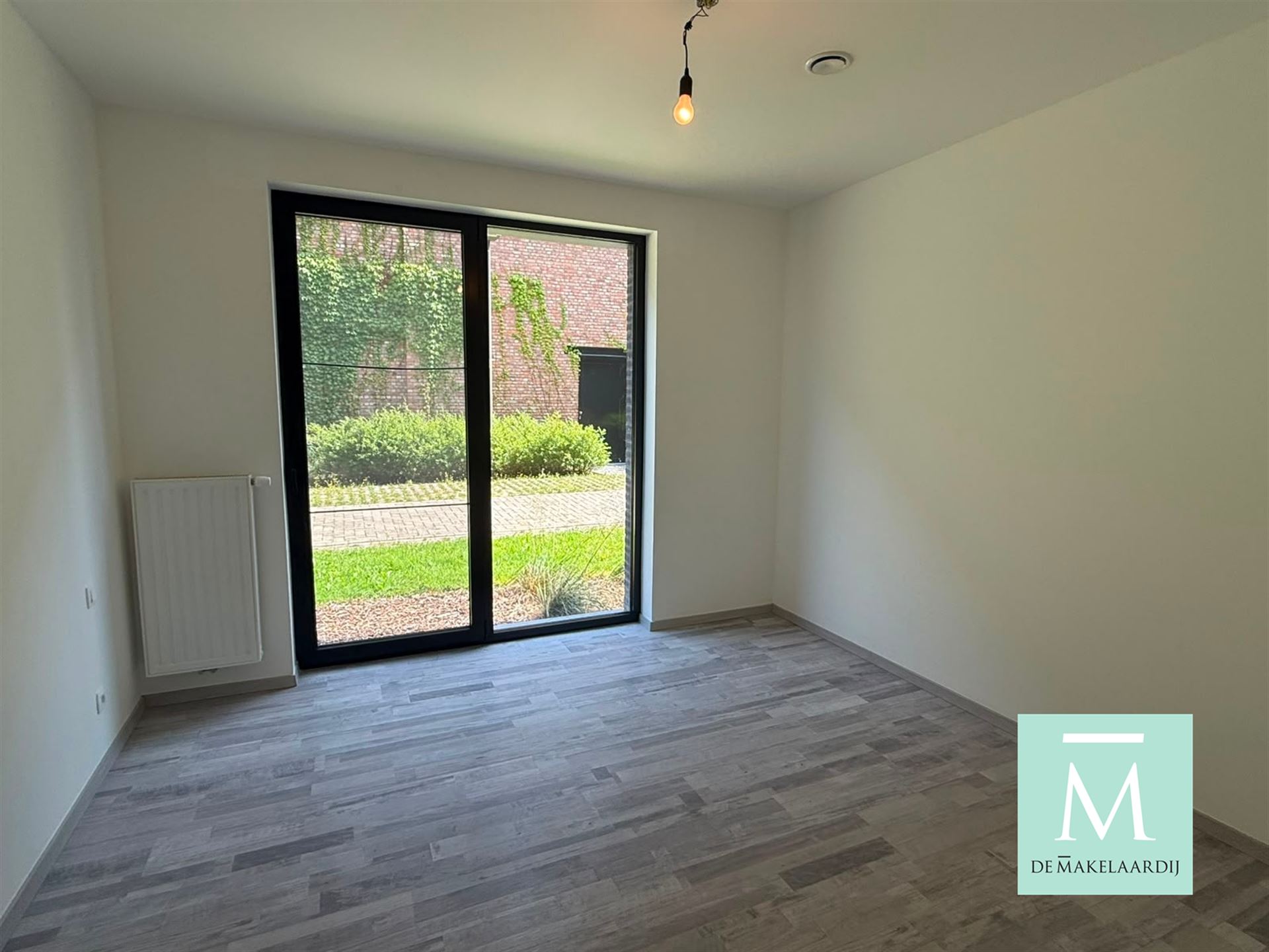 Nieuwbouwappartement met 2 slaapkamers en tuin! - foto 4