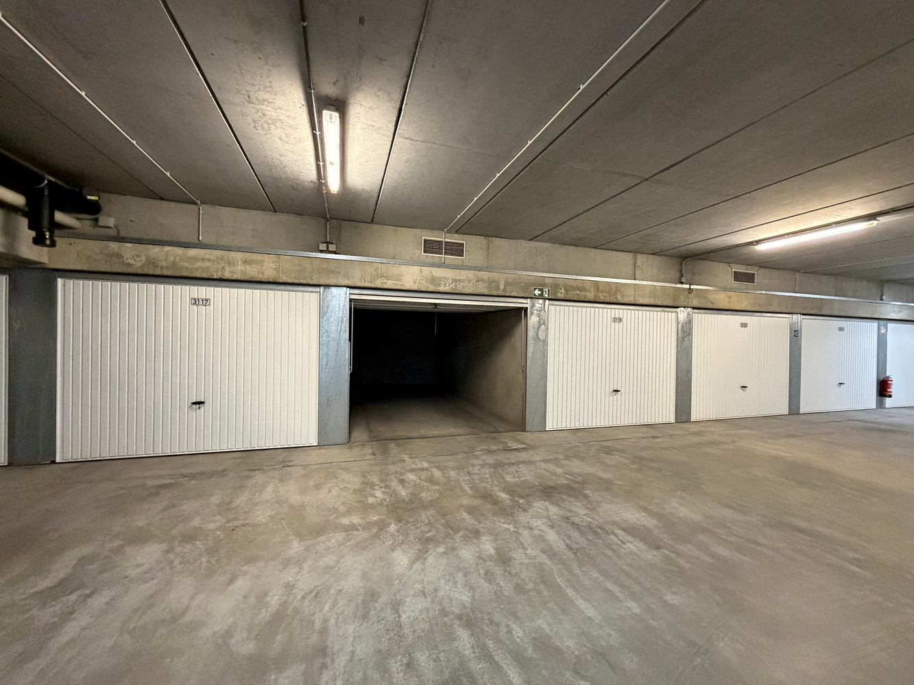Ruime garagebox in het Stubbenpark te Duinbergen - foto 3