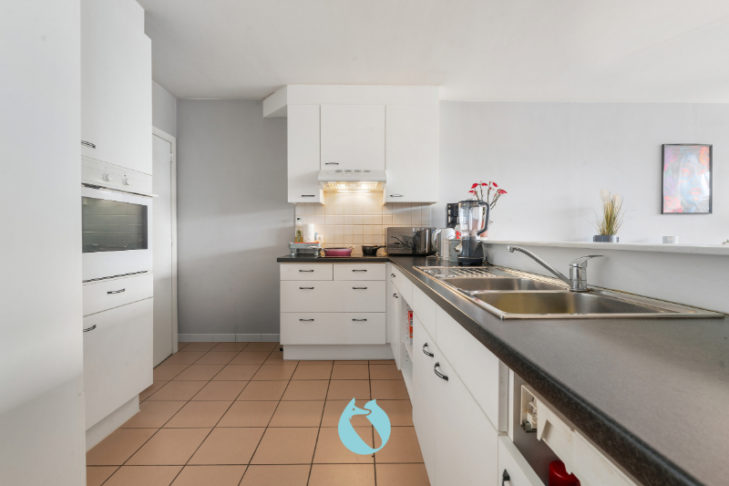 Gelijkvloers appartement met 2 slpks, tuin en garage - foto 5