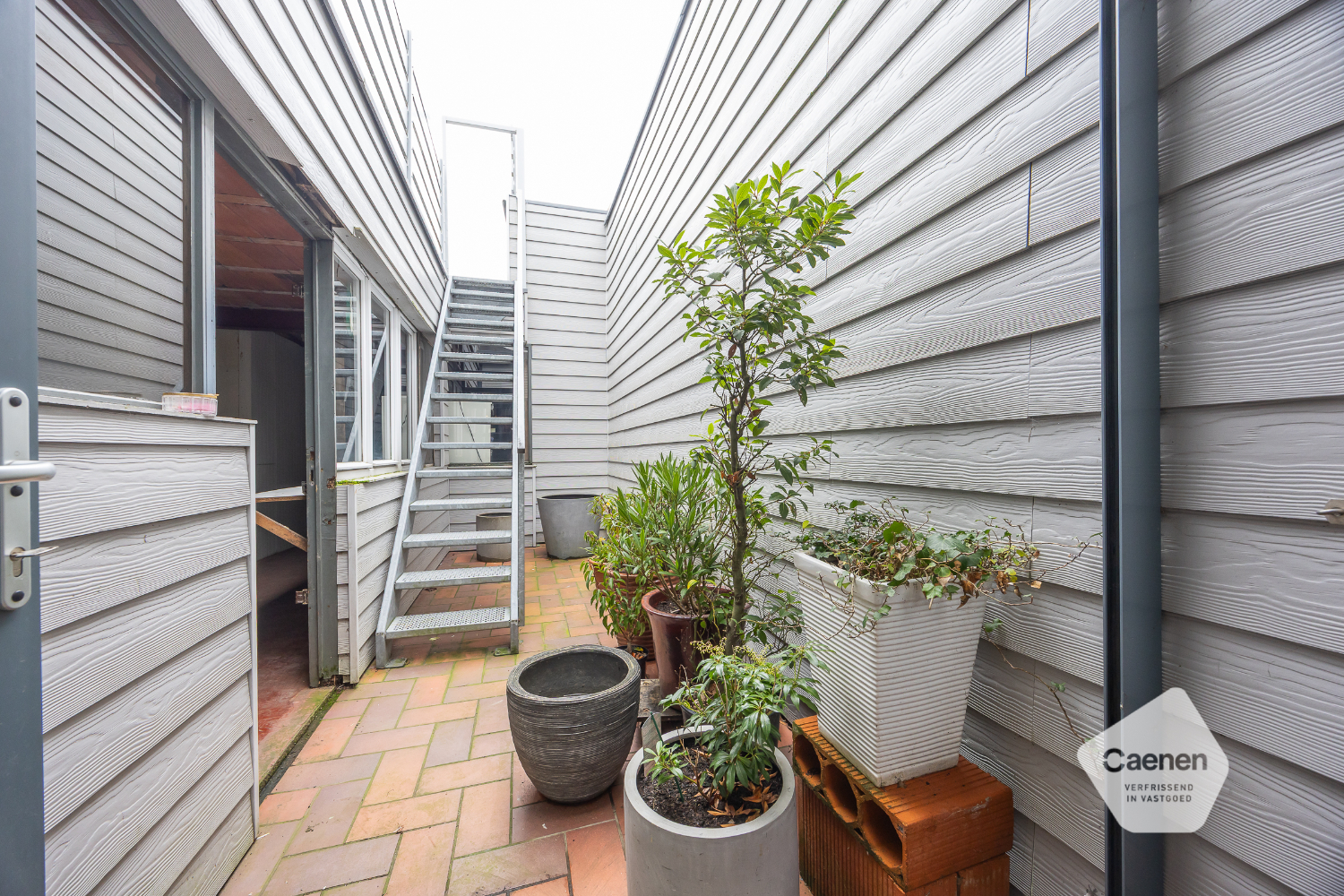 Woning met handelsgelijkvloers op commerciële ligging - foto 5